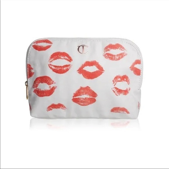 Charlotte Tilbury Handbags - 💋CHARLOTTE TILBURY 1ST EDITION LIP PRINT CANVAS MAKEUP BAG